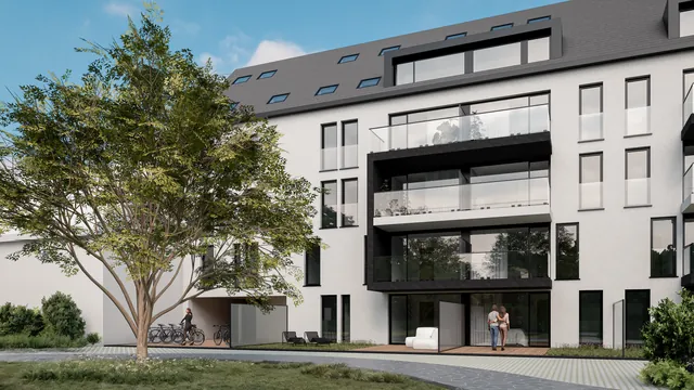 Tuingevel van Residentie De Swaene met gelijkvloers terras en fietsenstalling